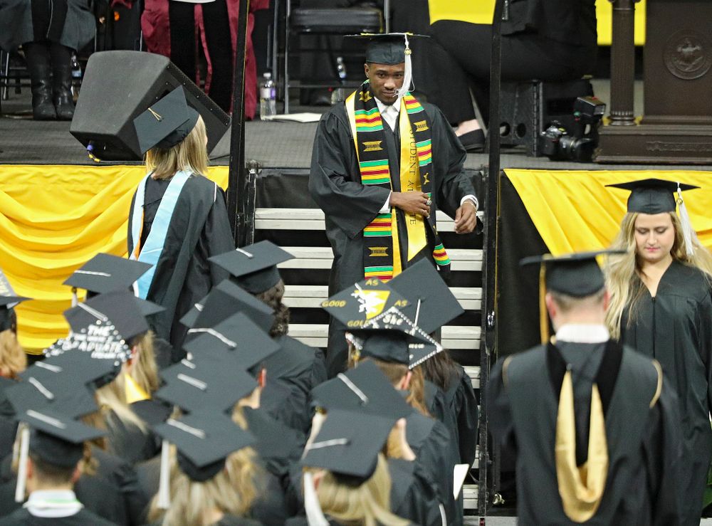 Iowa Track and Field’s Karayme Bartley during the College of Liberal Arts and Sciences and University College Fall 2019 Commencement ceremony at Carver-Hawkeye Arena in Iowa City on Saturday, December 21, 2019. (Stephen Mally/hawkeyesports.com)