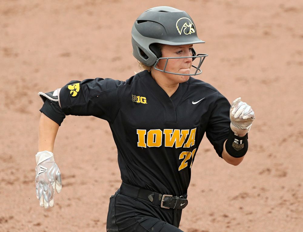 Iowa outfielder Havyn Monteer (21) runs to first after laying down a bunt single during the fifth inning of their game against Iowa Softball vs Indian Hills Community College at Pearl Field in Iowa City on Sunday, Oct 6, 2019. (Stephen Mally/hawkeyesports.com)