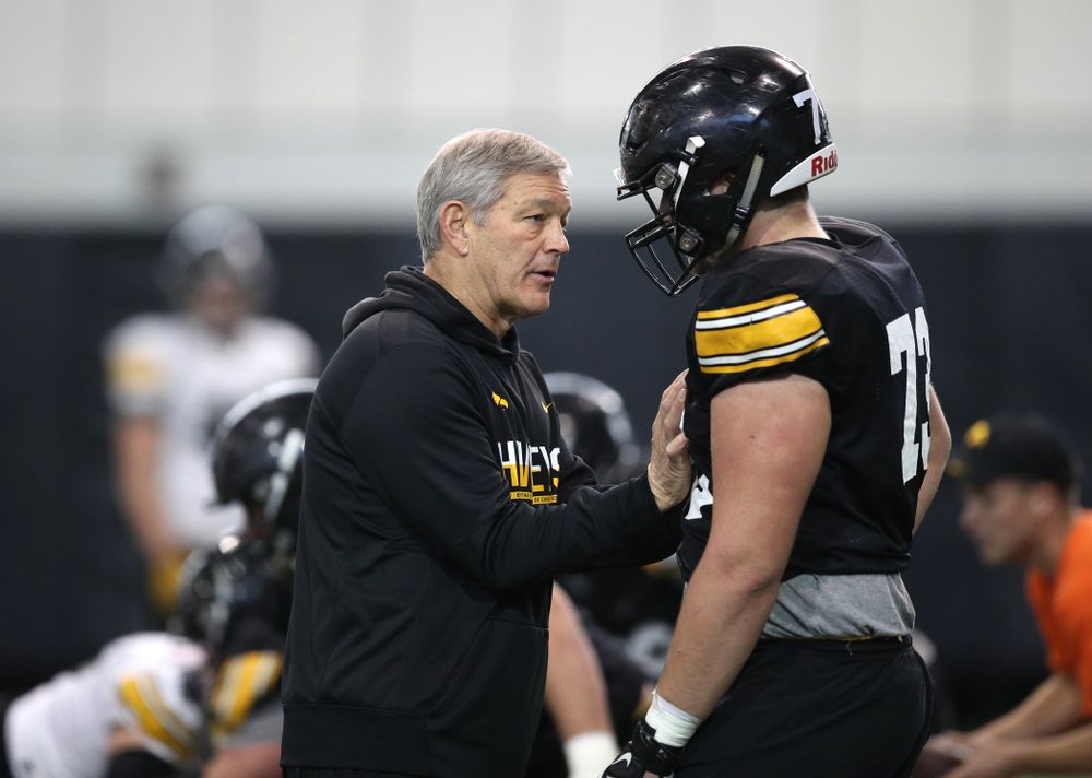 Iowa Hawkeyes head coach Kirk Ferentz and offensive lineman Cody Ince (73) during preparation for the 2019 Outback Bowl Monday, December 17, 2018 at the Hansen Football Performance Center. (Brian Ray/hawkeyesports.com)