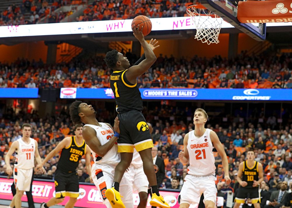 Iowa Hawkeyes guard Joe Toussaint (1) makes a basket during the second half of their ACC/Big Ten Challenge game at the Carrier Dome in Syracuse, N.Y. on Tuesday, Dec 3, 2019. (Stephen Mally/hawkeyesports.com)