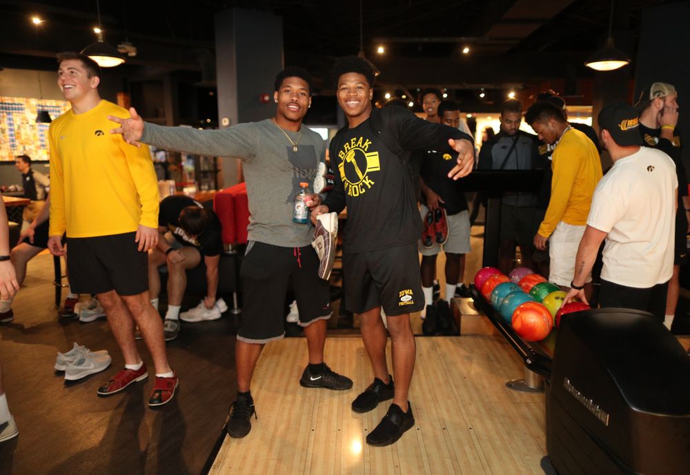 Iowa Hawkeyes wide receiver Tyrone Tracy Jr. (3) and defensive back Kaevon Merriweather (26) during the Players' Night at Splitsville Friday, December 28, 2018 in the Sparkman Wharf area of Tampa, FL.(Brian Ray/hawkeyesports.com)