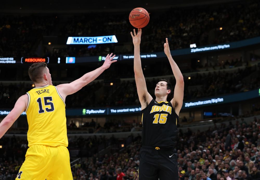 Iowa Hawkeyes forward Ryan Kriener (15) against the Michigan Wolverines in the 2019 Big Ten Men's Basketball Tournament Friday, March 15, 2019 at the United Center in Chicago. (Brian Ray/hawkeyesports.com)