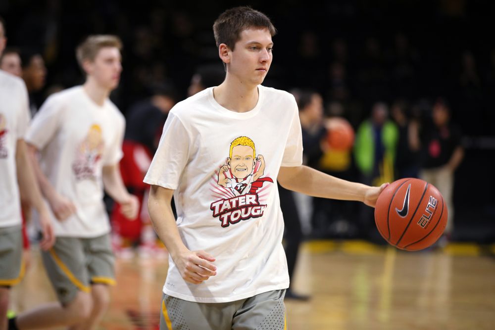 Iowa Hawkeyes guard Austin Ash (13) wears a Tater Tough t-shirt before their game against the Nebraska Cornhuskers Sunday, January 6, 2019 at Carver-Hawkeye Arena. (Brian Ray/hawkeyesports.com)