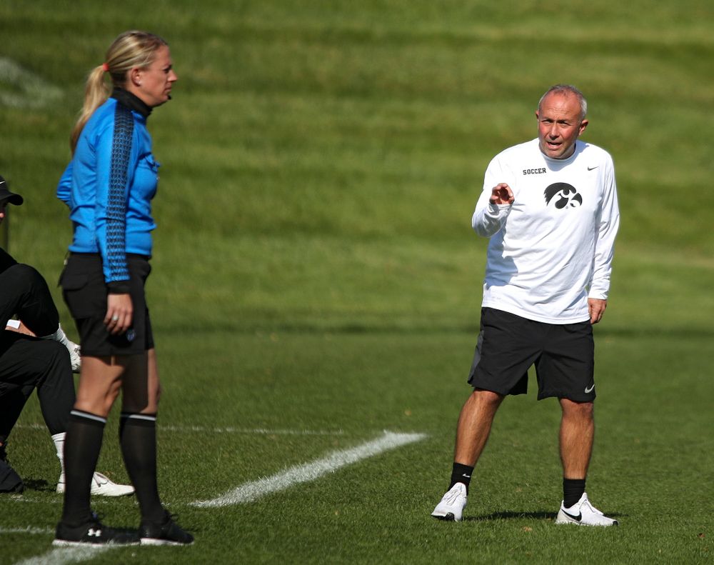 Iowa head coach Dave DiIanni talks with an official during the first half of their match at the Iowa Soccer Complex in Iowa City on Sunday, Oct 27, 2019. (Stephen Mally/hawkeyesports.com)