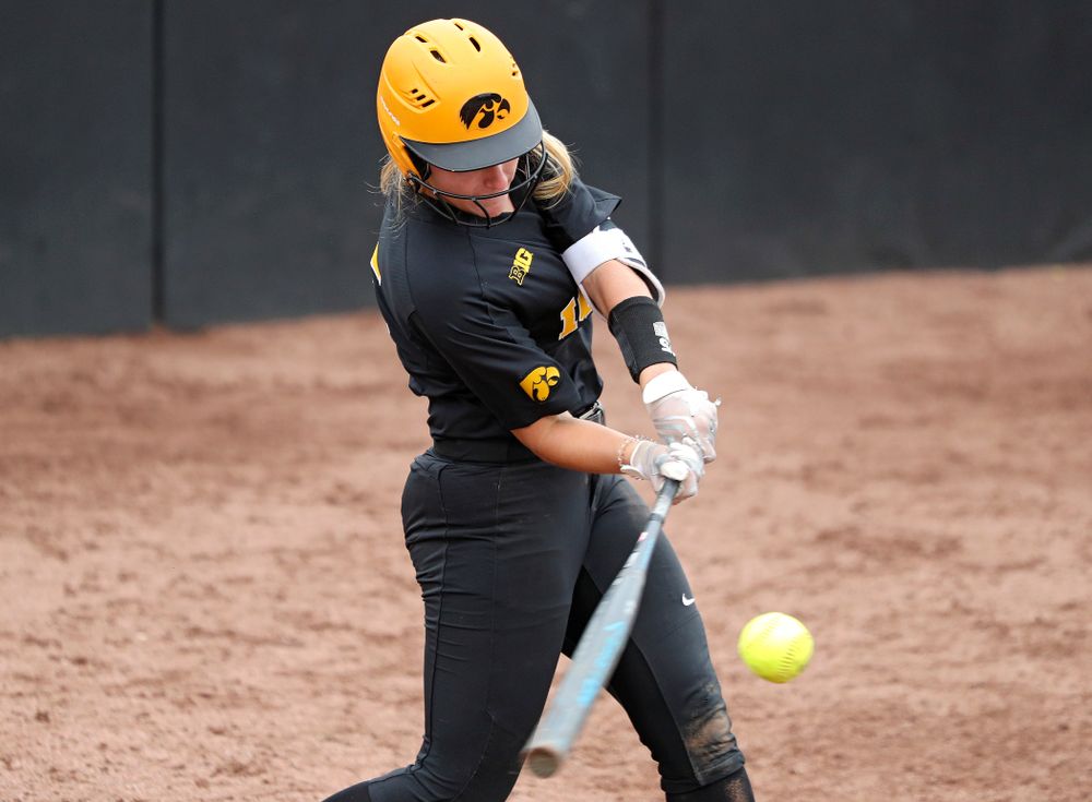 Iowa infielder Erin Carter (15) bats during the fourth inning of their game against Iowa Softball vs Indian Hills Community College at Pearl Field in Iowa City on Sunday, Oct 6, 2019. (Stephen Mally/hawkeyesports.com)