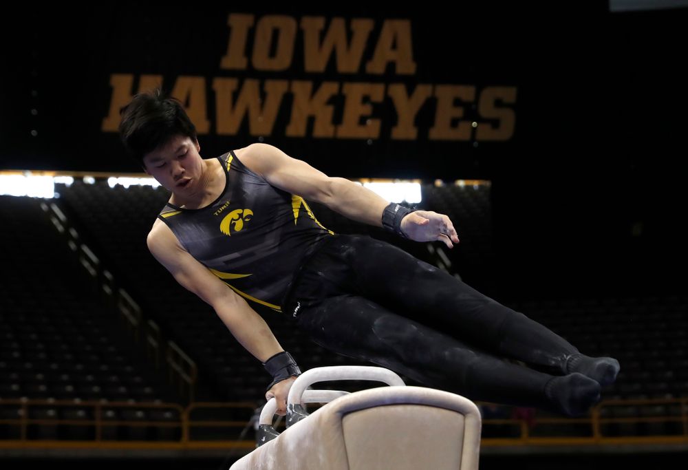 Bennet Huang competes on the pommel horse  against Minnesota and Air Force 