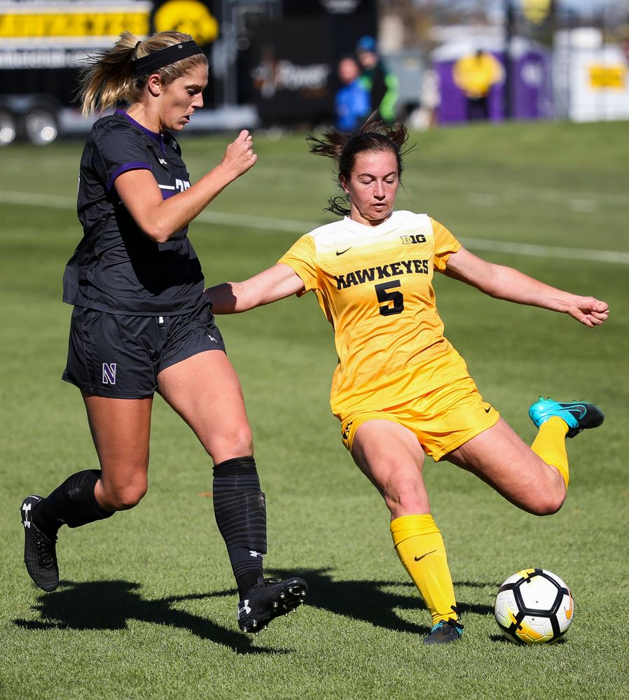 Iowa Hawkeyes defender Riley Whitaker (5) passes the ball during a game against Northwestern at the Iowa Soccer Complex on October 21, 2018. (Tork Mason/hawkeyesports.com)