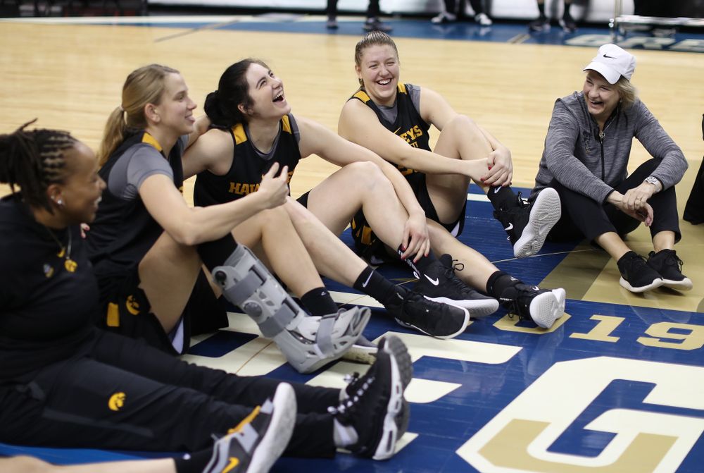 The Iowa Hawkeyes talk in their circle at the end of shoot around before their game against the NC State Wolfpack in the regional semi-final of the 2019 NCAA Women's College Basketball Tournament Saturday, March 30, 2019 at Greensboro Coliseum in Greensboro, NC.(Brian Ray/hawkeyesports.com)