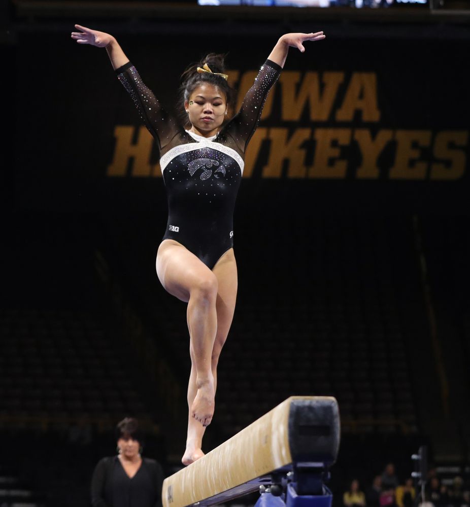 Iowa's Misty-Jade Carlson competes on the beam against the Rutgers Scarlet Knights Saturday, January 26, 2019 at Carver-Hawkeye Arena. (Brian Ray/hawkeyesports.com)