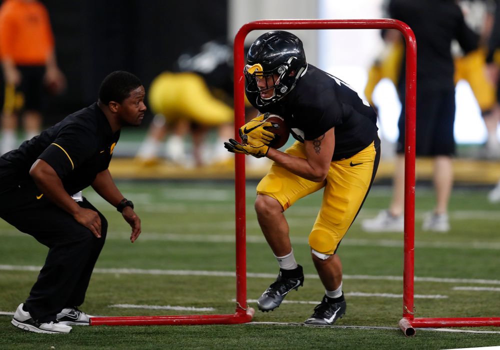 Iowa Hawkeyes running back Camron Harrell (10) and running backs coach Derrick Foster during spring practice Wednesday, March 28, 2018 at the Hansen Football Performance Center.  (Brian Ray/hawkeyesports.com)