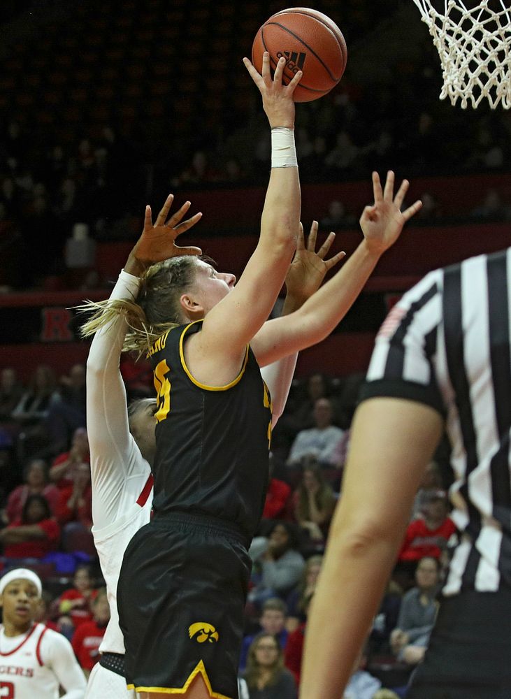 Iowa forward/center Monika Czinano (25) scores a basket during the fourth quarter of their game at the Rutgers Athletic Center in Piscataway, N.J. on Sunday, March 1, 2020. (Stephen Mally/hawkeyesports.com)