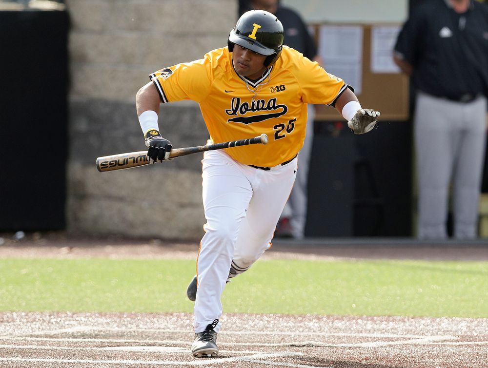 Iowa Hawkeyes first baseman Izaya Fullard (20) tosses his bat after walking during the third inning of their game against Northern Illinois at Duane Banks Field in Iowa City on Tuesday, Apr. 16, 2019. (Stephen Mally/hawkeyesports.com)