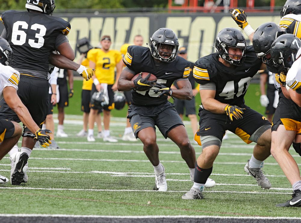Iowa Hawkeyes running back Tyler Goodson (15) on a run during Fall Camp Practice No. 15 at the Hansen Football Performance Center in Iowa City on Monday, Aug 19, 2019. (Stephen Mally/hawkeyesports.com)