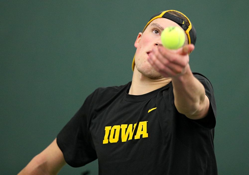 Iowa’s Joe Tyler serves during his singles match at the Hawkeye Tennis and Recreation Complex in Iowa City on Friday, February 14, 2020. (Stephen Mally/hawkeyesports.com)
