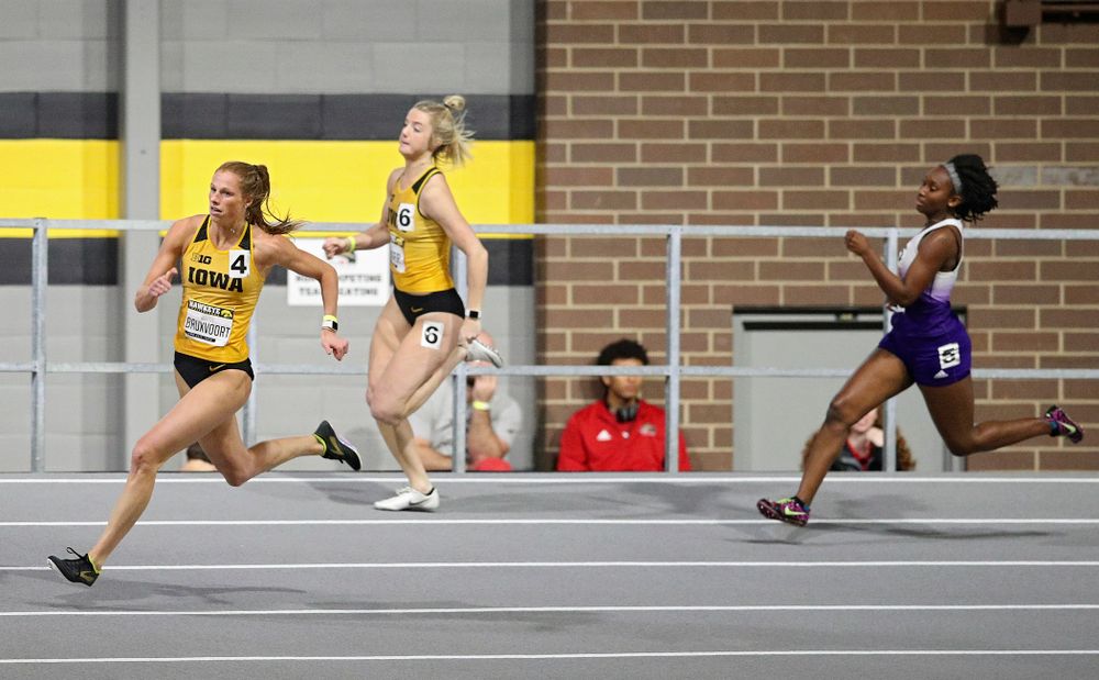 Iowa’s Mariel Bruxvoort (from left) and Sydney Winger run the women’s 200 meter dash event during the Hawkeye Invitational at the Recreation Building in Iowa City on Saturday, January 11, 2020. (Stephen Mally/hawkeyesports.com)