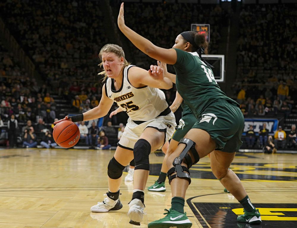 Iowa Hawkeyes forward Monika Czinano (25) drives with the ball during the second quarter of their game at Carver-Hawkeye Arena in Iowa City on Sunday, January 26, 2020. (Stephen Mally/hawkeyesports.com)