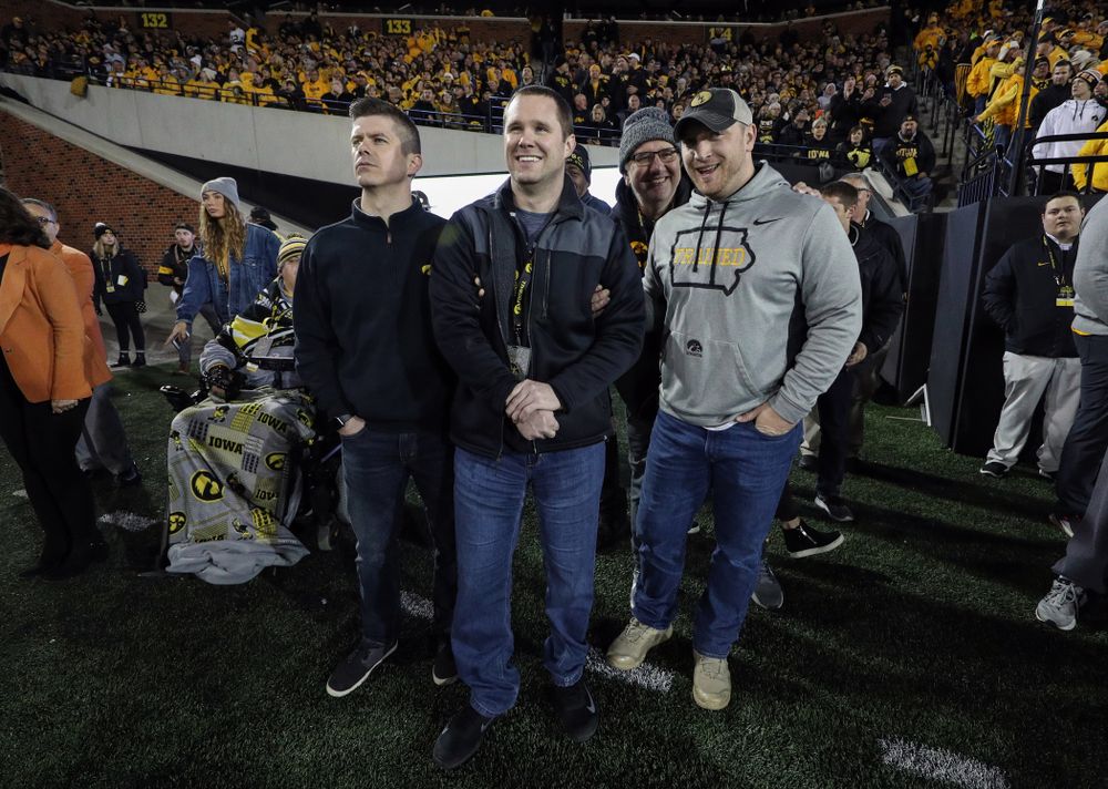 Former Hawkeyes Joe Conklin, Brett Greenwood, and Pat Angerer are recognized with the rest of the 2009 team during the Iowa Hawkeyes game against the Penn State Nittany Lions Saturday, October 12, 2019 at Kinnick Stadium. (Brian Ray/hawkeyesports.com)
