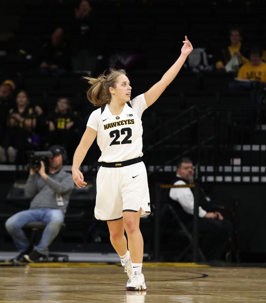 Iowa Hawkeyes guard Kathleen Doyle (22) pumps up the crowd against the Wisconsin Badgers Monday, January 7, 2019 at Carver-Hawkeye Arena.  (Brian Ray/hawkeyesports.com)