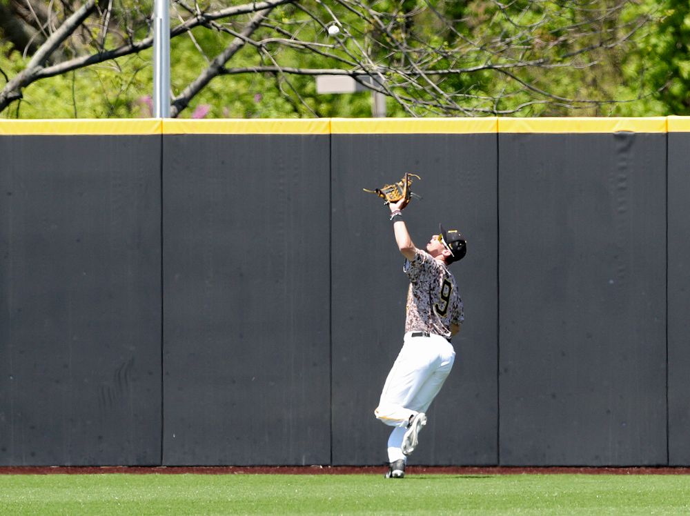 Iowa Hawkeyes center fielder Ben Norman (9) pulls in a fly ball for an out during the second inning of their game against UC Irvine at Duane Banks Field in Iowa City on Sunday, May. 5, 2019. (Stephen Mally/hawkeyesports.com)