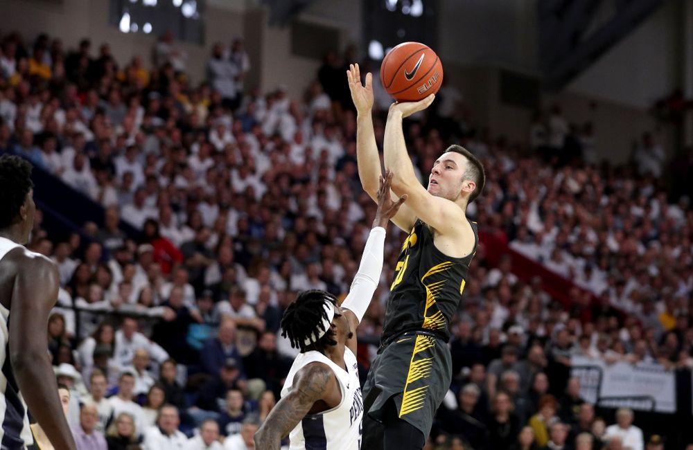 Iowa Hawkeyes guard Connor McCaffery (30) pulls up for a shot against Penn State Friday, January 3, 2020 at the Palestra in Philadelphia. (Brian Ray/hawkeyesports.com)