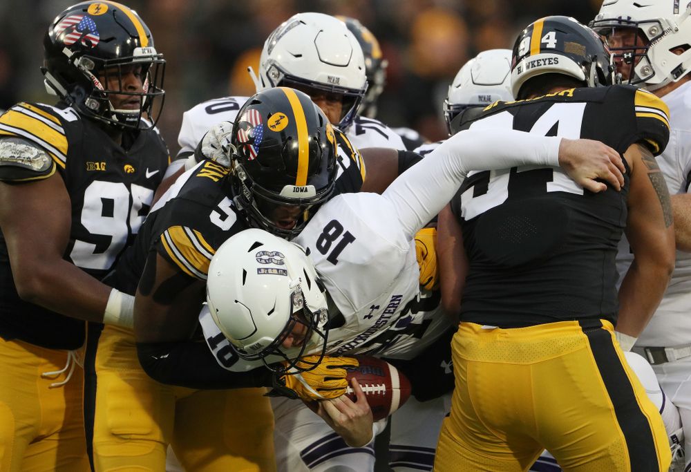 Iowa Hawkeyes defensive end Chauncey Golston (57) and defensive end A.J. Epenesa (94) against the Northwestern Wildcats Saturday, November 10, 2018 at Kinnick Stadium. (Brian Ray/hawkeyesports.com)