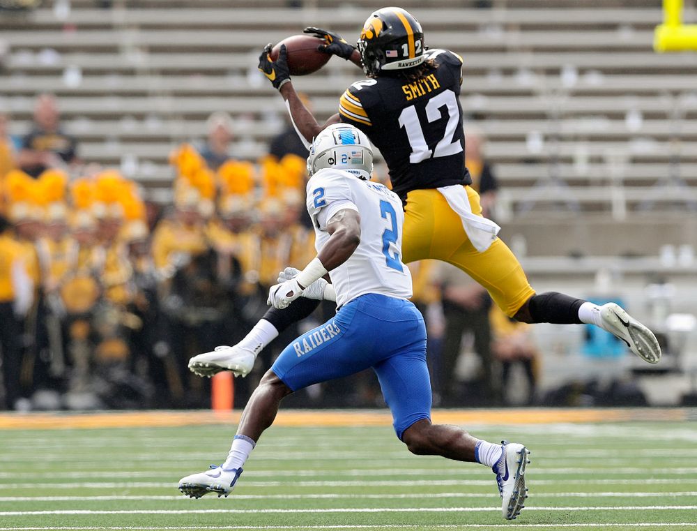 Iowa Hawkeyes wide receiver Brandon Smith (12) pulls in a pass during the second quarter of their game at Kinnick Stadium in Iowa City on Saturday, Sep 28, 2019. (Stephen Mally/hawkeyesports.com)