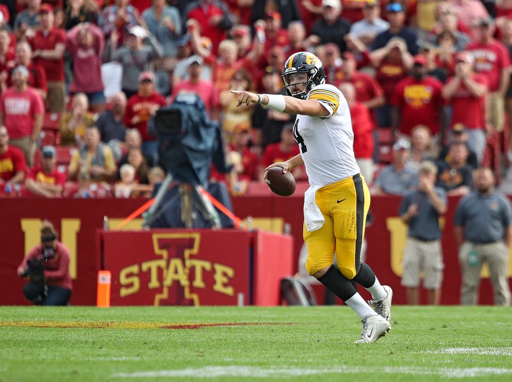 Iowa Hawkeyes quarterback Nate Stanley (4) points as he looks to pass during the second quarter of their Iowa Corn Cy-Hawk Series game at Jack Trice Stadium in Ames on Saturday, Sep 14, 2019. (Stephen Mally/hawkeyesports.com)