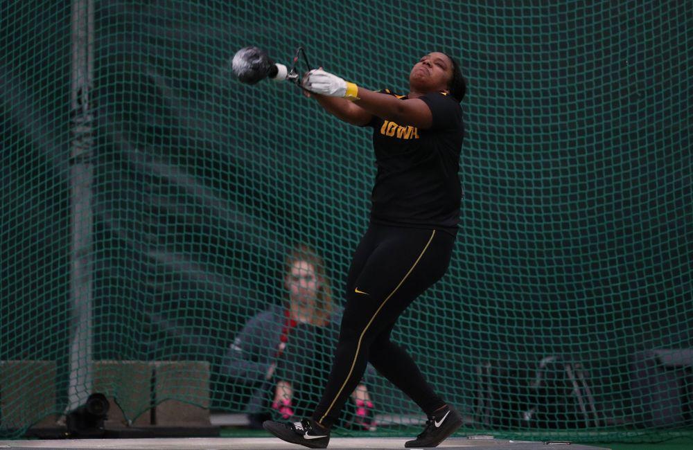 Iowa's Nia Britt competes in the weight throw Friday, January 11, 2019 at the Hawkeye Tennis and Recreation Center. (Brian Ray/hawkeyesports.com)