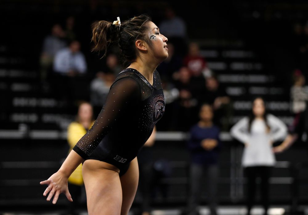 Nicole Chow competes on the floor  