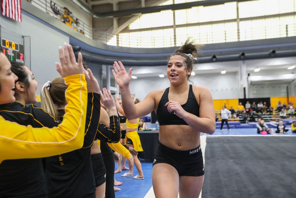 Ariana Agrapides high fives teammates during the Iowa women’s gymnastics Black and Gold Intraquad Meet on Saturday, December 7, 2019 at the UI Field House. (Lily Smith/hawkeyesports.com)