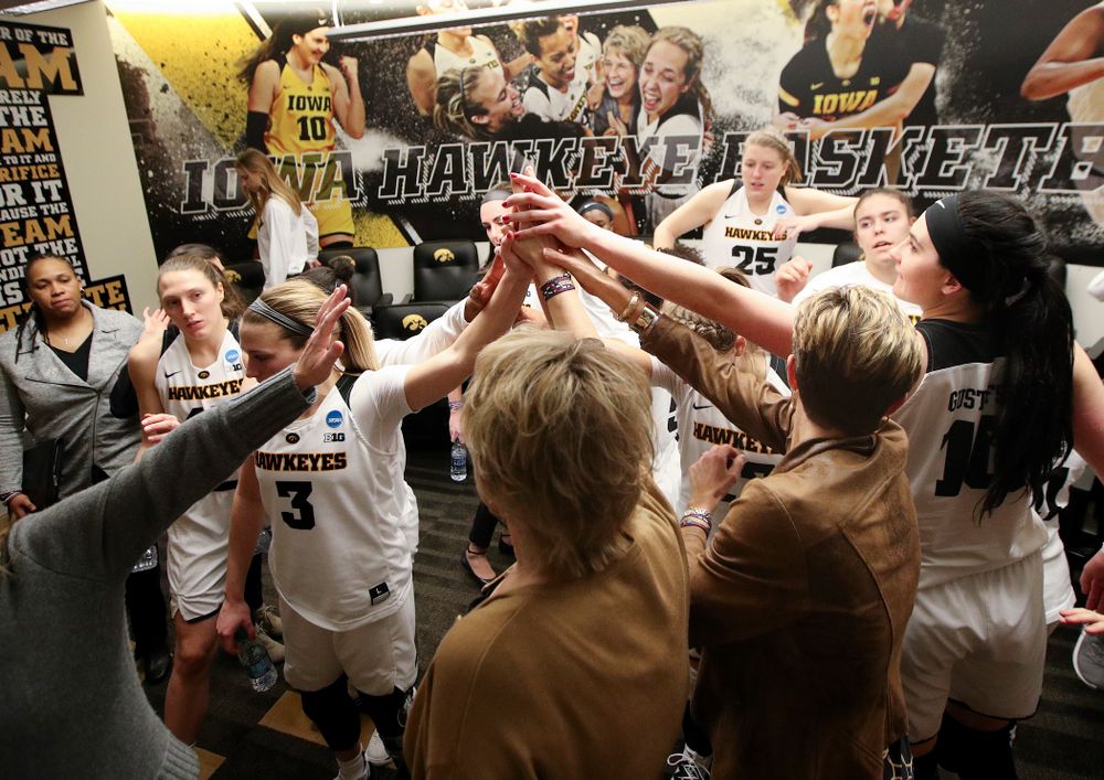 The Iowa Hawkeyes huddle after winning their game during the first round of the 2019 NCAA Women's Basketball Tournament at Carver Hawkeye Arena in Iowa City on Friday, Mar. 22, 2019. (Stephen Mally for hawkeyesports.com)