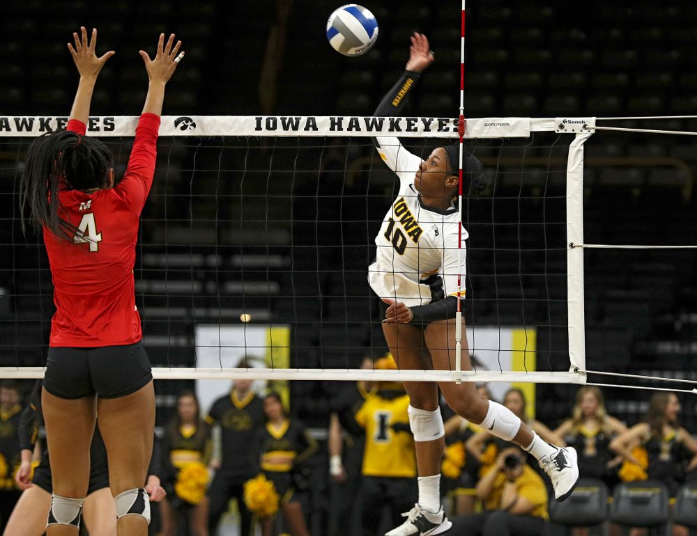 Iowa’s Griere Hughes (10) lines up a kill during the third set of their match at Carver-Hawkeye Arena in Iowa City on Saturday, Nov 30, 2019. (Stephen Mally/hawkeyesports.com)
