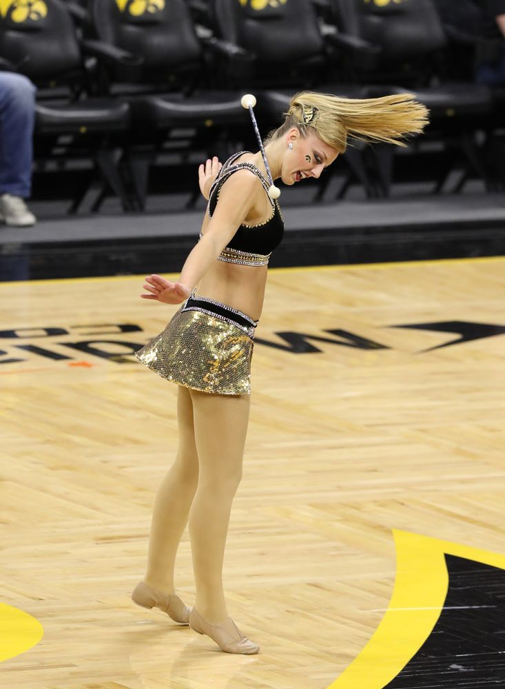 Hawkeye Marching Band Golden Girl Kylene Spanbauer against the Michigan Wolverines Thursday, January 17, 2019 at Carver-Hawkeye Arena. (Brian Ray/hawkeyesports.com)