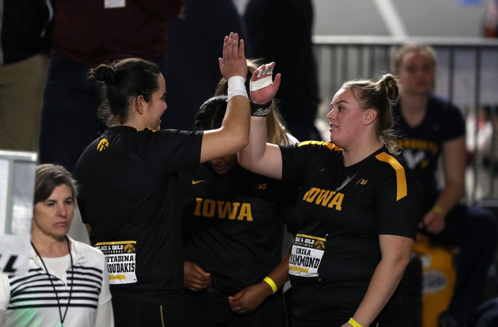 Iowa's Konstadina Spanoudakis high fives Erika Hammond as they compete in the Shot Put during the Black and Gold Premier meet Saturday, January 26, 2019 at the Recreation Building. (Brian Ray/hawkeyesports.com)