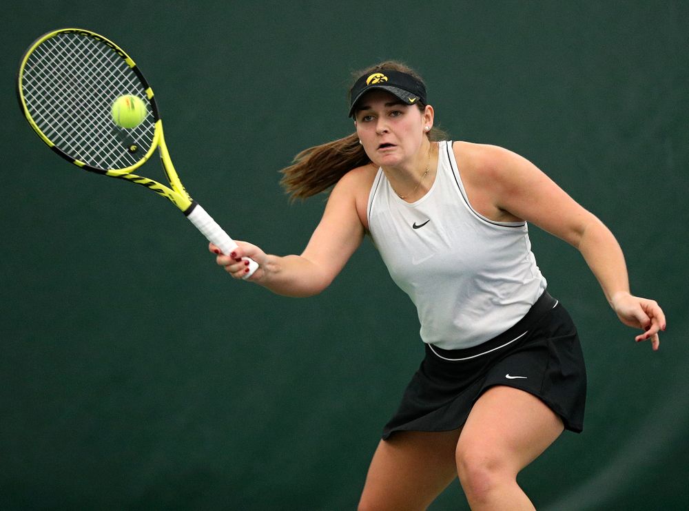 Iowa’s Danielle Bauers returns a shot during her singles match at the Hawkeye Tennis and Recreation Complex in Iowa City on Sunday, February 16, 2020. (Stephen Mally/hawkeyesports.com)