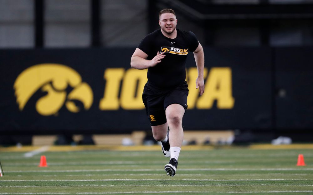 Iowa Hawkeyes offensive lineman Ike Boettger (75) during the team's annual pro day Monday, March 26, 2018 at the Hansen Football Performance Center. (Brian Ray/hawkeyesports.com)