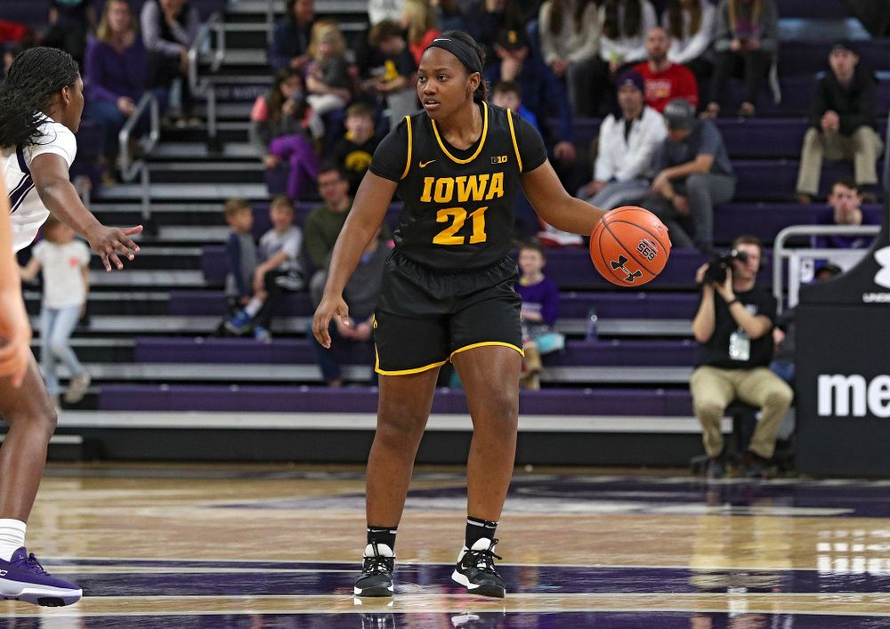 Iowa Hawkeyes guard Zion Sanders (21) brings the ball down the court during the fourth quarter of their game at Welsh-Ryan Arena in Evanston, Ill. on Sunday, January 5, 2020. (Stephen Mally/hawkeyesports.com)