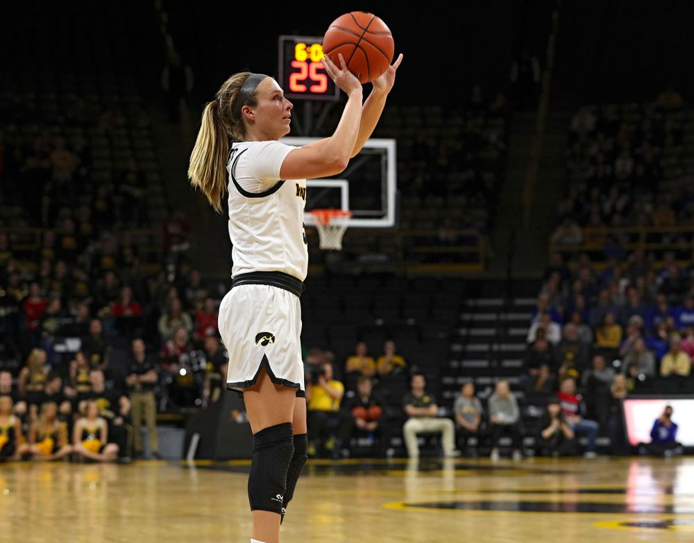 Iowa Hawkeyes guard Makenzie Meyer (3) makes a 3-pointer during the third quarter of their game at Carver-Hawkeye Arena in Iowa City on Saturday, December 21, 2019. (Stephen Mally/hawkeyesports.com)
