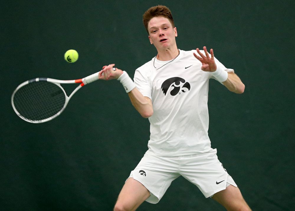 Iowa’s Jason Kerst returns a shot during his singles match at the Hawkeye Tennis and Recreation Complex in Iowa City on Sunday, February 16, 2020. (Stephen Mally/hawkeyesports.com)