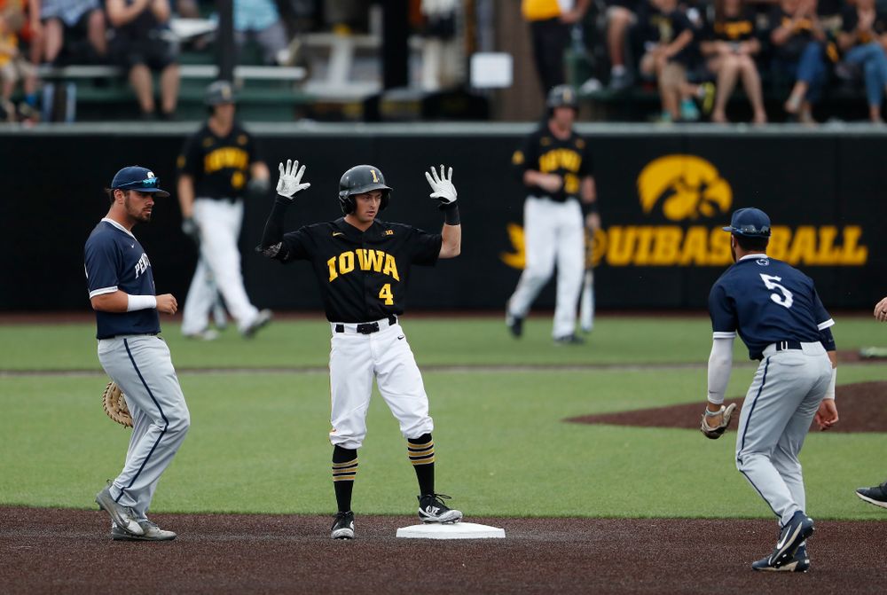 Iowa Hawkeyes infielder Mitchell Boe (4) doubles against the Penn State Nittany Lions Friday, May 18, 2018 at Duane Banks Field. (Brian Ray/hawkeyesports.com)
