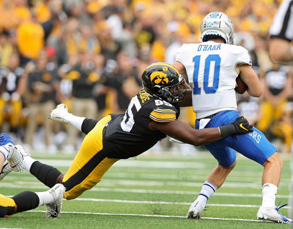 Iowa Hawkeyes defensive lineman Cedrick Lattimore (95) sacks Middle Tennessee State quarterback Asher O’Hara (10) during the first quarter of their game at Kinnick Stadium in Iowa City on Saturday, Sep 28, 2019. (Stephen Mally/hawkeyesports.com)