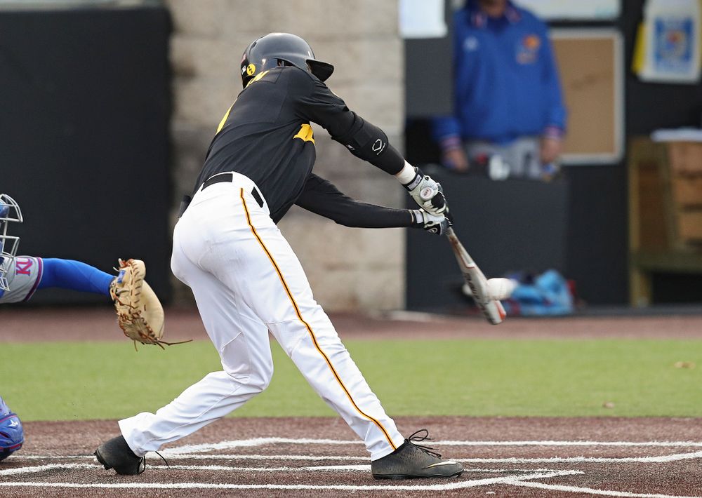 Iowa outfielder Ben Norman (9) gets a hit during the eighth inning of their college baseball game at Duane Banks Field in Iowa City on Tuesday, March 10, 2020. (Stephen Mally/hawkeyesports.com)