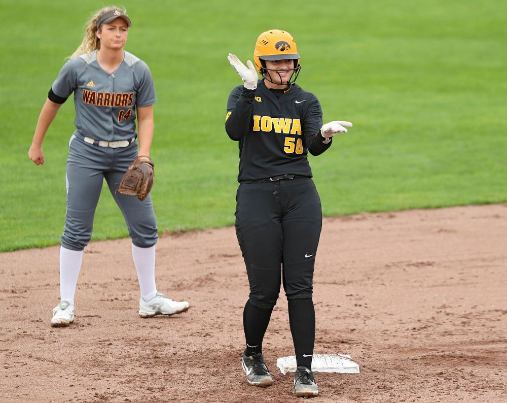 Iowa infielder Kalena Burns (50) celebrates after hitting a double during the fourth inning of their game against Iowa Softball vs Indian Hills Community College at Pearl Field in Iowa City on Sunday, Oct 6, 2019. (Stephen Mally/hawkeyesports.com)