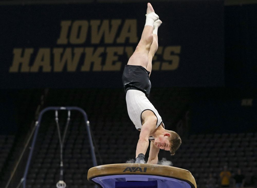 Iowa's Stewart Brown competes in the vault during the second day of the Big Ten Men's Gymnastics Championships at Carver-Hawkeye Arena in Iowa City on Saturday, Apr. 6, 2019. (Stephen Mally/hawkeyesports.com)
