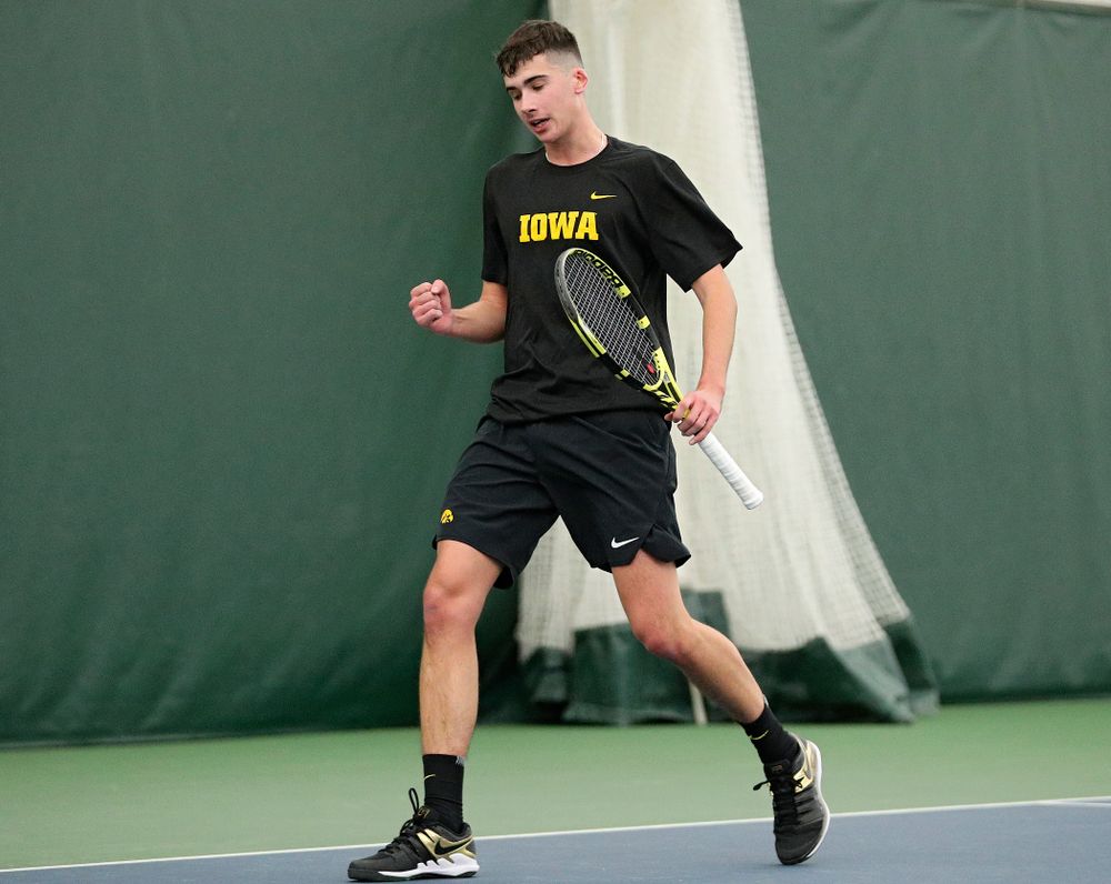 Iowa’s Matt Clegg celebrates a point during their match at the Hawkeye Tennis and Recreation Complex in Iowa City on Thursday, January 16, 2020. (Stephen Mally/hawkeyesports.com)