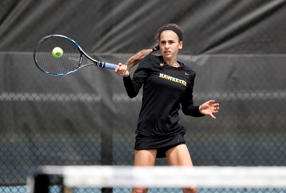 Iowa's Adrienne Jensen against the Wisconsin Badgers Sunday, April 22, 2018 at the Hawkeye Tennis and Recreation Center. (Brian Ray/hawkeyesports.com)