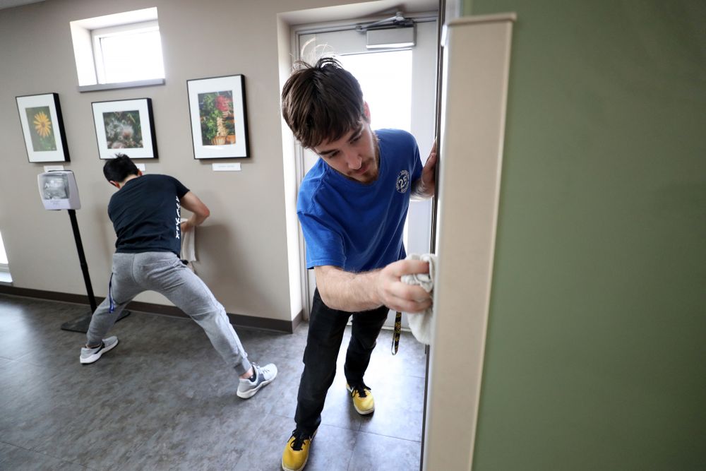 Members of the MenÕs Gymnastics team volunteer at CommUnity Crisis Services and Food Bank during the annual Iowa Athletics Day of Caring  Sunday, April 28, 2019 in Iowa City. (Brian Ray/hawkeyesports.com)