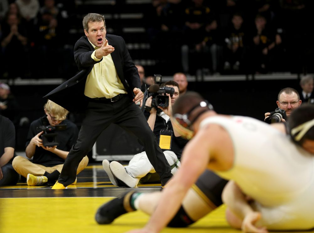Iowa head coach Tom Brands looks for a takedown as Tony Cassioppi wrestles Ohio State’s Gary Traub at heavyweight Friday, January 24, 2020 at Carver-Hawkeye Arena. Cassioppi won the match 9-3. (Brian Ray/hawkeyesports.com)