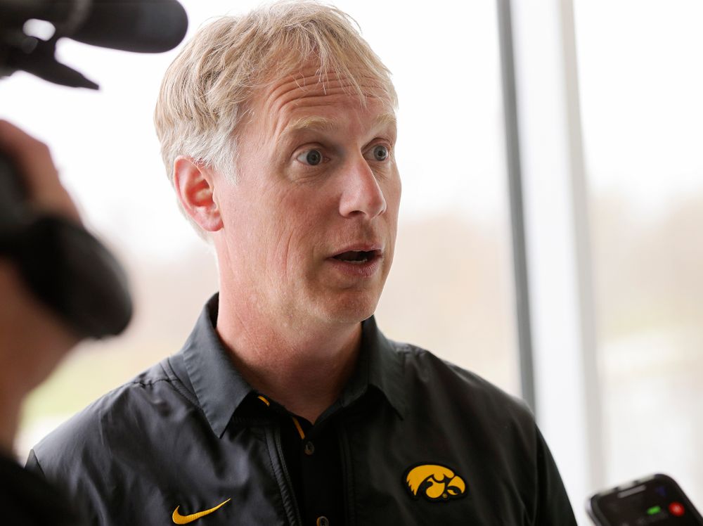 Iowa head coach Andrew Carter answers a question during media availability at the P. Sue Beckwith, M.D., Boathouse in Iowa City on Wednesday, Apr. 10, 2019. (Stephen Mally/hawkeyesports.com)