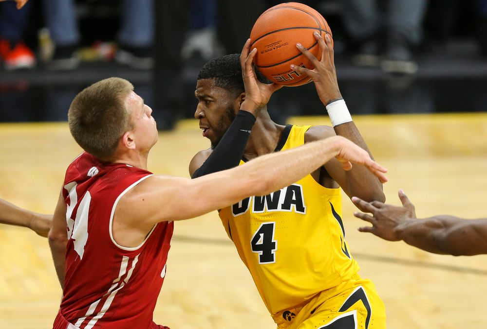 Iowa Hawkeyes guard Isaiah Moss (4) drives to the basket against Wisconsin on November 30, 2018 at Carver-Hawkeye Arena. (Tork Mason/hawkeyesports.com)